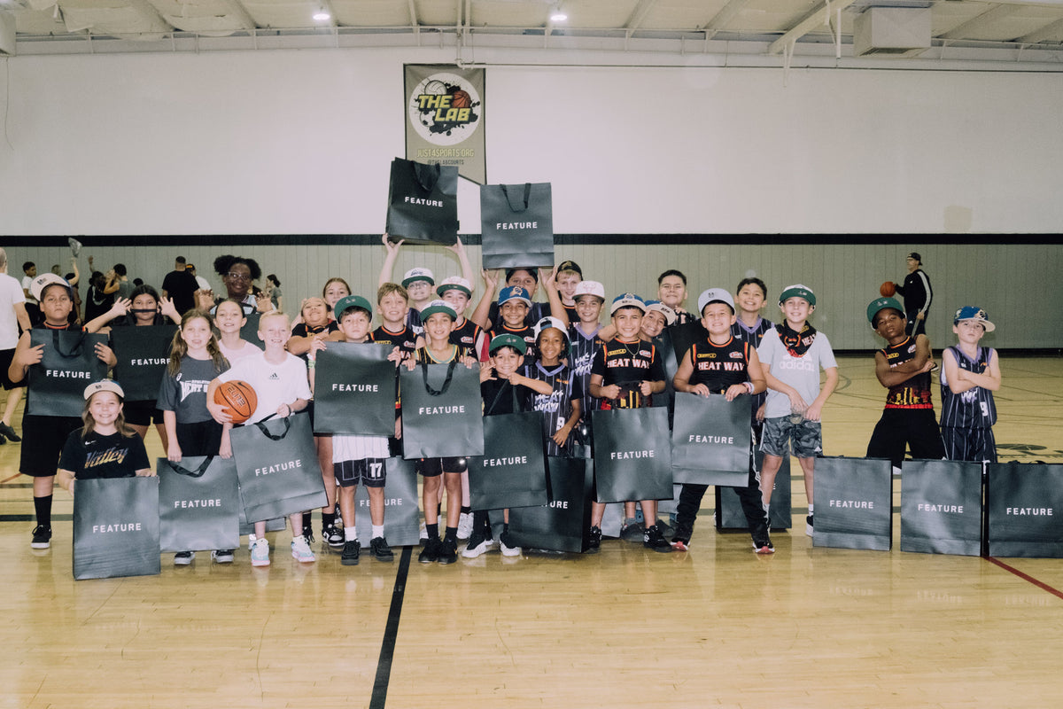 Adrian Rios and youth at the FEATURE x Adidas and Heat Wav event 