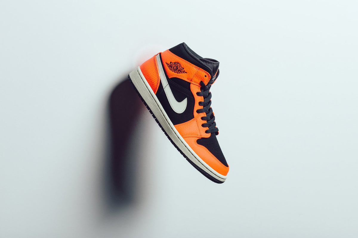 Air Jordan 1 Mid "Black/Cone/Light Bone" Available Now