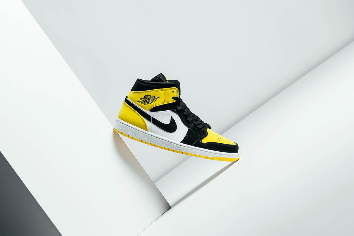Air Jordan 1 Mid SE "Black/Tour Yellow/White" Available Now
