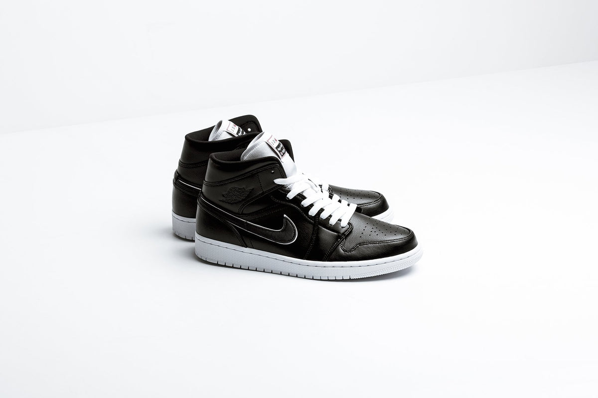 Air Jordan 1 Mid SE "Black/Black/White" Available Now